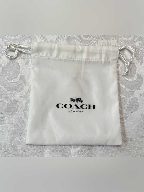 Coach Accessories - Coach Satin Drawstring Jewelry Pouch in White with Black Logo NWOT